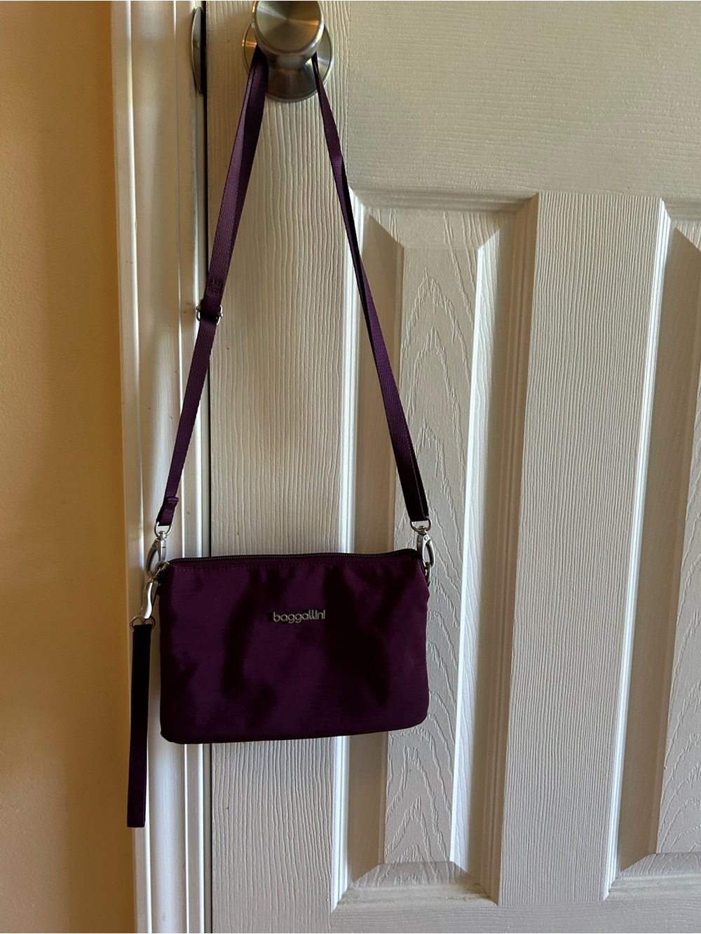 Baggallini Plum Crossbody Bag with adjustable strap and wristlet strap